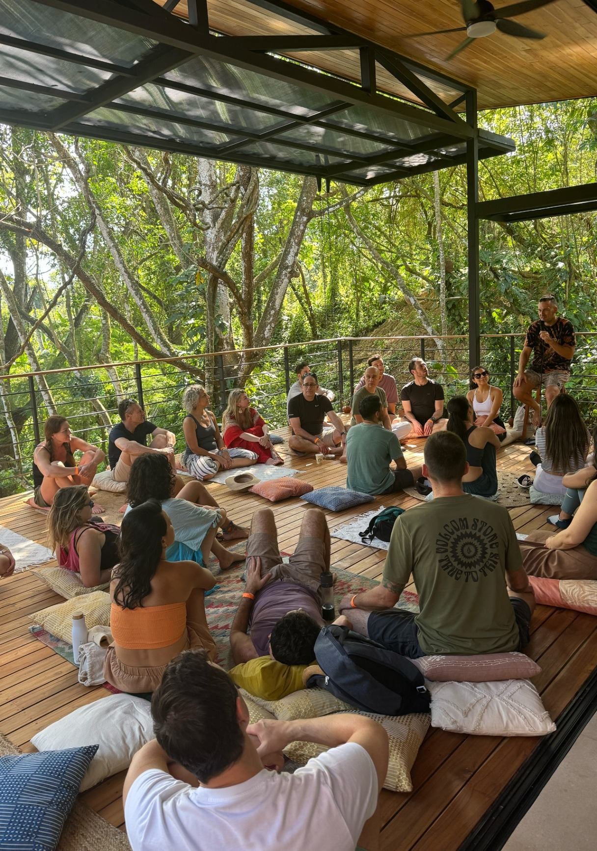 POD members in a circle in the jungle
